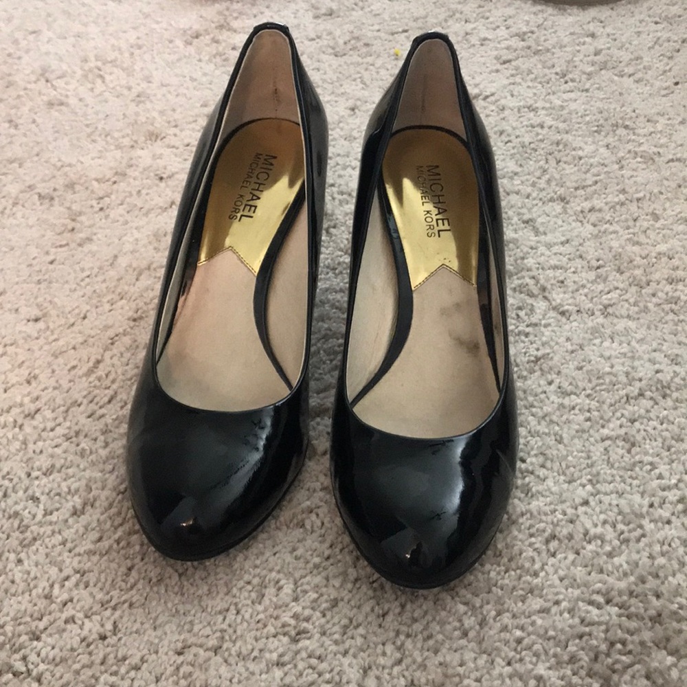 Michael Kors black patent pumps
